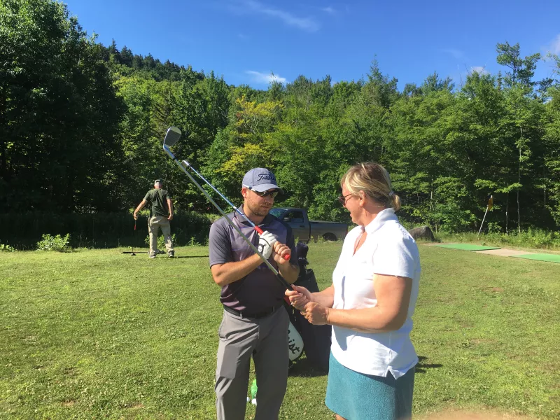 Evan giving a golf lesson