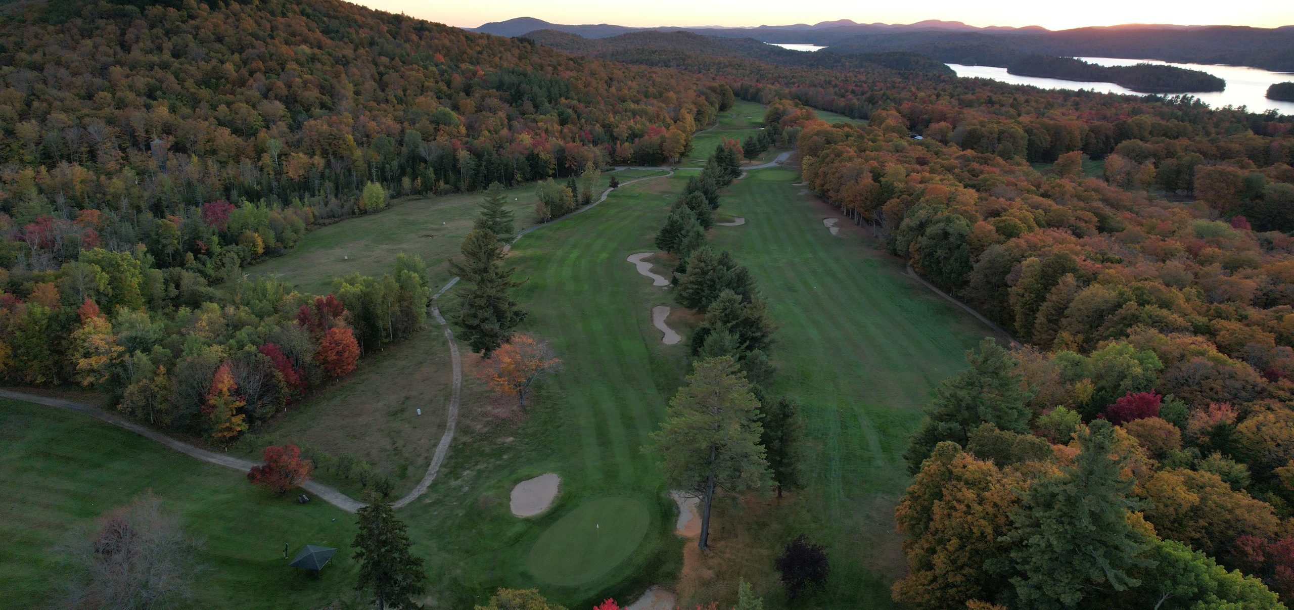 Drone shot looking over 4 and 9 fairway in the fall