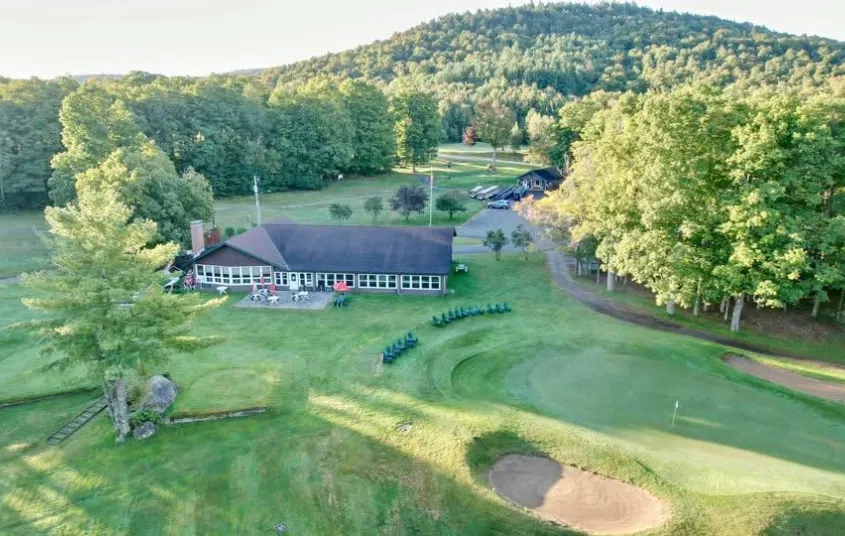 Aerial shot of clubhouse and 18 green