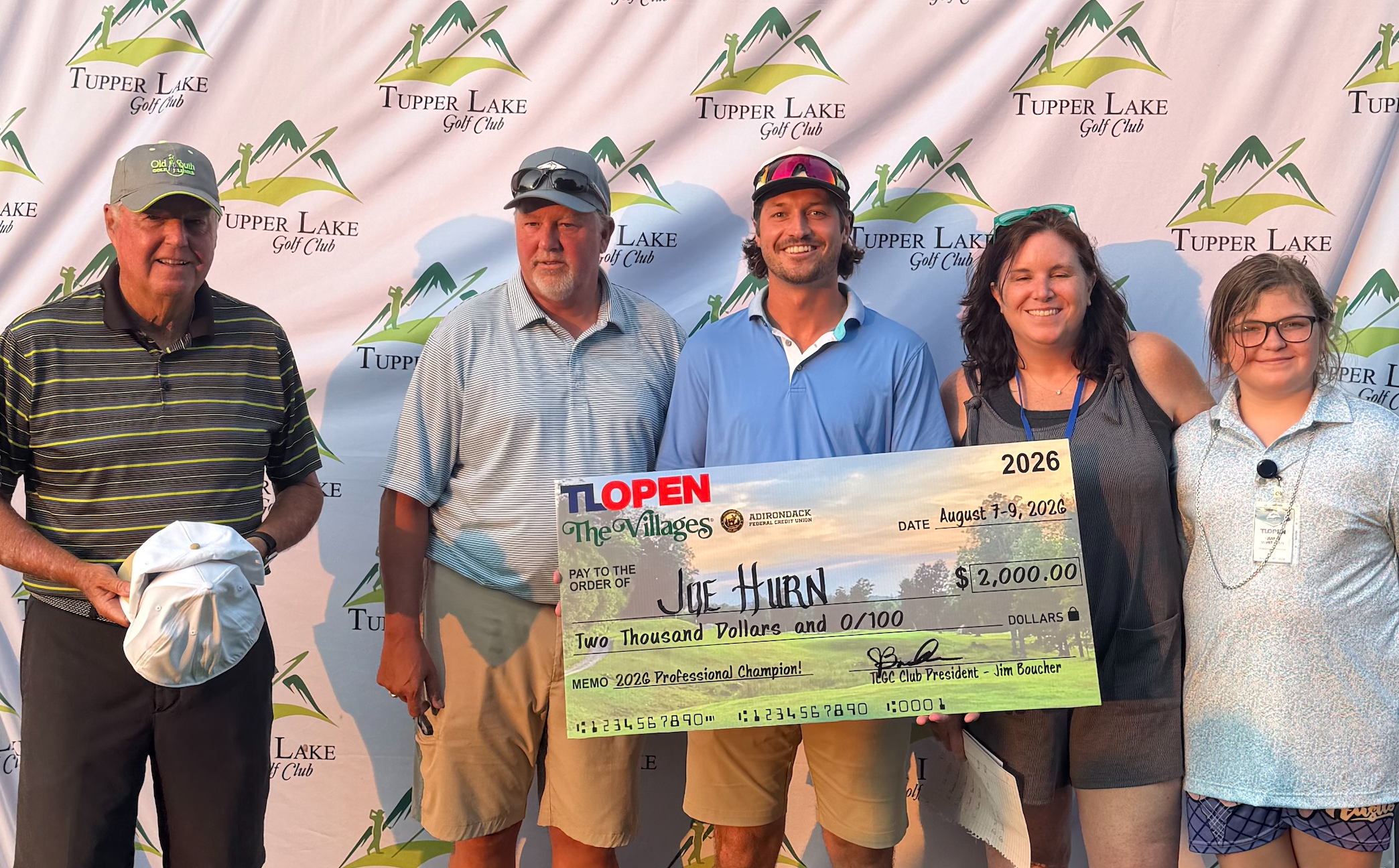 Joe Hurn with his first place check at the 77th Tupper Lake Open